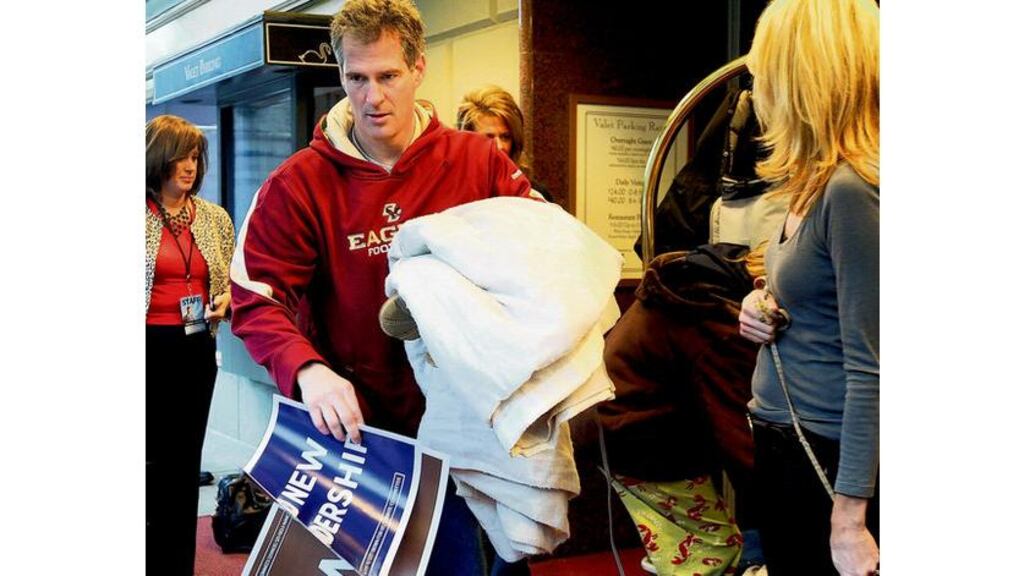 Republican senator-elect Scott Brown leaving the Park Plaza Hotel, Boston, yesterday. Brown beat Massachusetts attorney general Martha Coakley in an election to fill the seat held for more than four decades by the late Edward Kennedy.