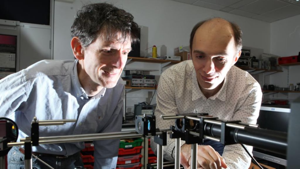 NUI Galway scientists Dr Nicholas Devaney (left) of the school of physics at NUIG, and Dr Alexander Goncharov, who are developing optics technologies for use in large space telescopes. photograph: Aengus McMahon
