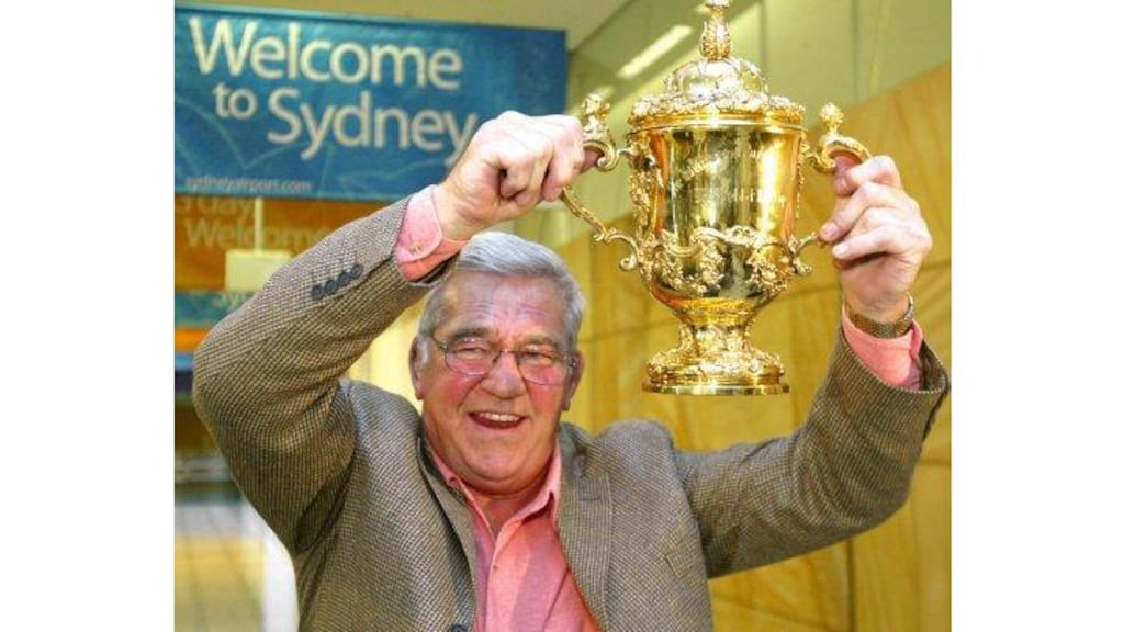 "We will be deciding the venue for the 2011 World Cup later this year and we may well plump for a country outside the top eight," says IRB chairman Dr Syd Millar, seen here with the Webb Ellis Trophy.