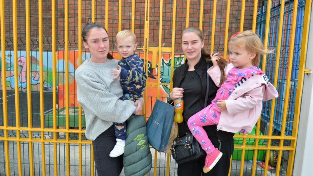 Stacey Spain with her son Korbin and Nicole Reilly with her daughter Kaiya on Sheriff Street.  “I would’ve loved to get a place around here but there’s no houses,” said Ms Reilly. Photograph: Alan Betson