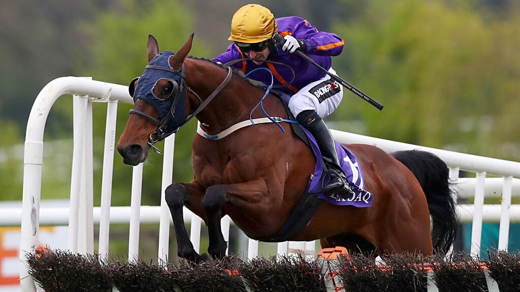 Wicklow Brave ridden by Jockey Patrick Mullins clears the fence on his way to winning the Betdaq Punchestown Champion Hurdle during day four of the Punchestown Festival. Photo: Brian Lawless/PA Wire