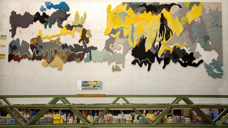 The process of hand-tufting a carpet can take up to 12 weeks. A work-in-progress of a carpet created for a Parisian dining room.