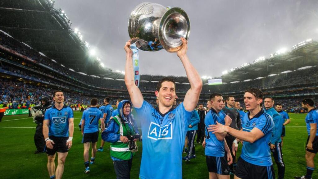Dublin’s Rory O’Carroll celebrates with the Sam Maguire cup after the game - Dublin bring the trophy to O’Connell street at 7.15pm tonight. Photograph: Cathal Noonan/Inpho