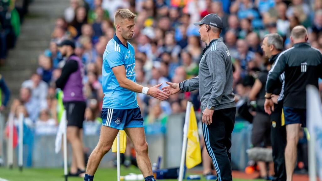 Dublin’s Jonny Cooper after his red card in the All-Ireland final with manager Jim Gavin. Photograph: Morgan Treacy/Inpho