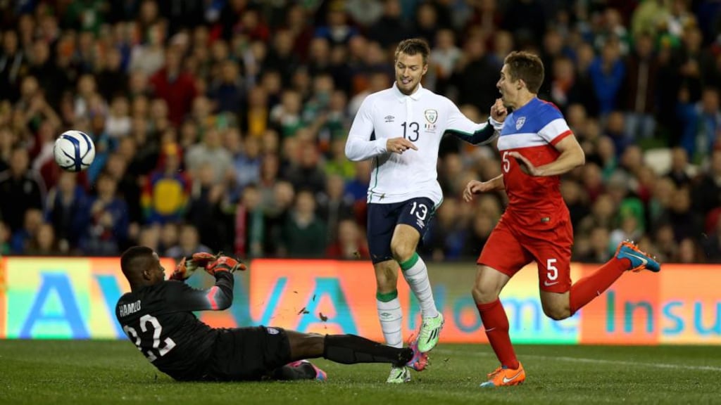 Anthony Pinlkington dinks the ball over an onrushing Hamid for Ireland’s opener against the USA at the Aviva Stadium tonight