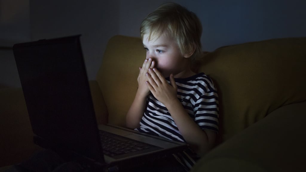 Setting limits on your kids’ screen time won’t work if your own head is constantly buried in a screen. Photograph: Getty Images