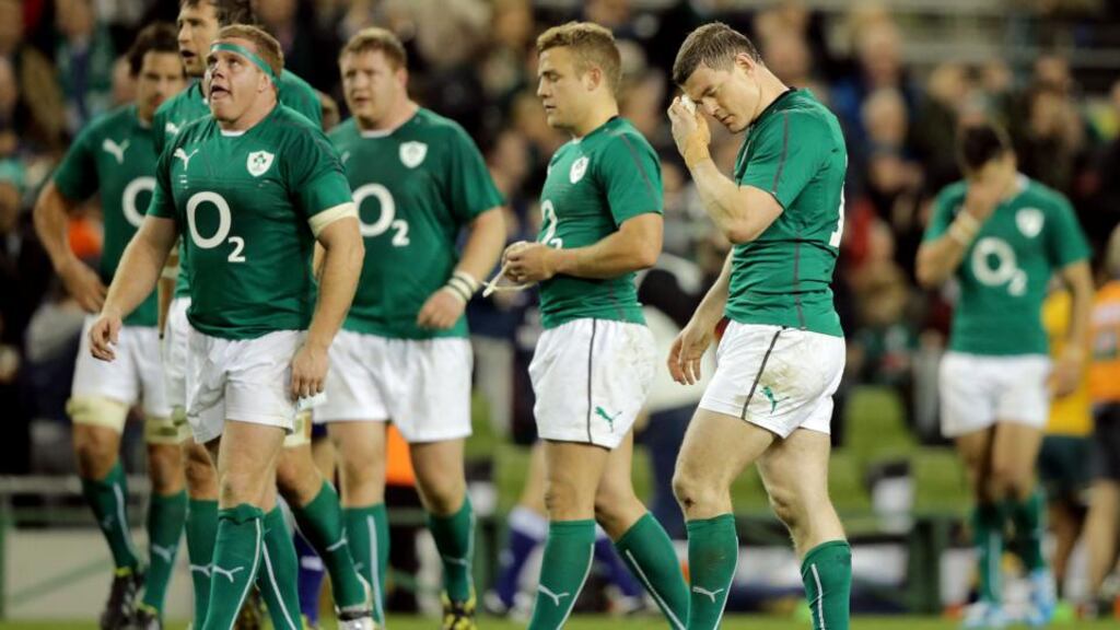 Ireland’s Seán Cronin, Ian Madigan and Brian O’Driscoll after the defeat to Australia game. Photograph: Morgan Treacy/Inpho