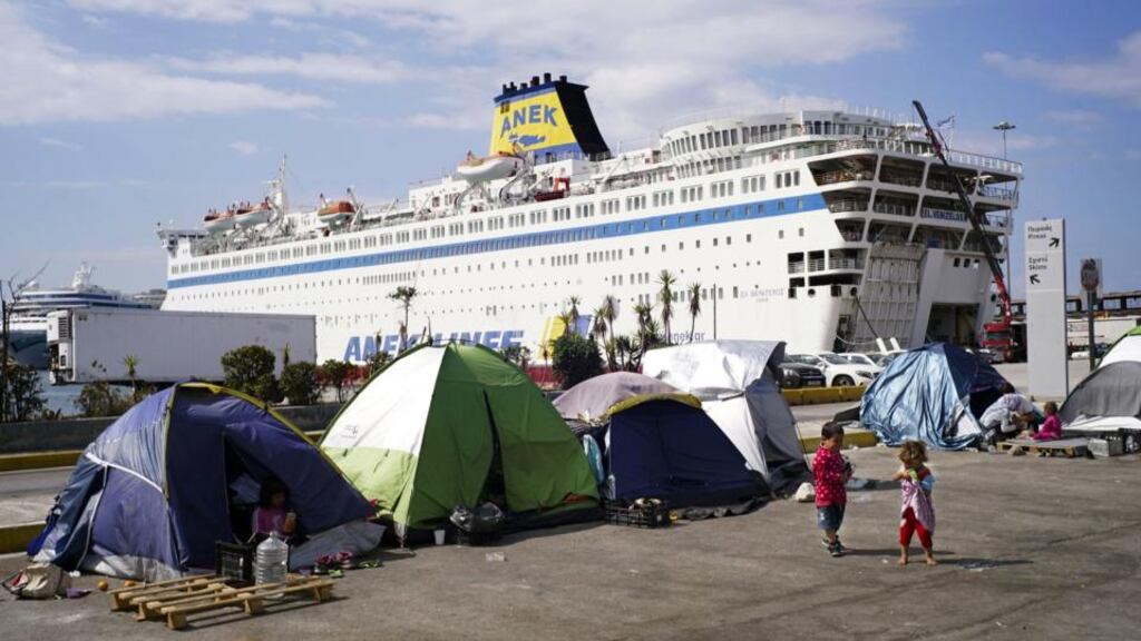 Tents of migrants and refugees in the port of Piraeus, Athens, Greece. Photograph: Milos Bicanski/Getty Images