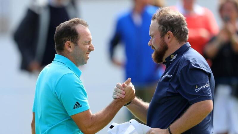 Sergio Garcia of Spain and Shane Lowry of Ireland shake hands on the 9th green at the end of their first rounds at the Andalucia Valderrama Masters at Real Club Valderrama in Cadiz, Spain. Photo: Warren Little/Getty Images