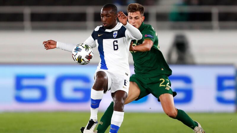 Jayson Molumby challenges Finland’s Glen Kamara. Photograph: Kalle Parkkinen/Inpho