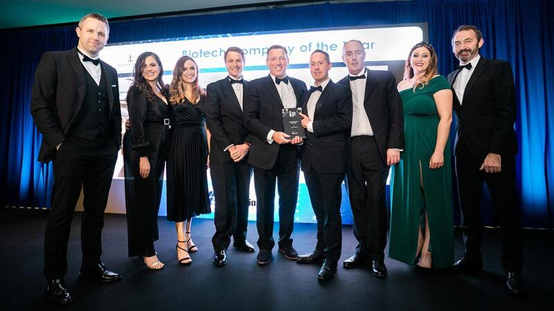 Peter McNamara, Managing Director, Micro-Bio Ireland presents the Biotech Company of the Year award to the Alexion Ireland team.