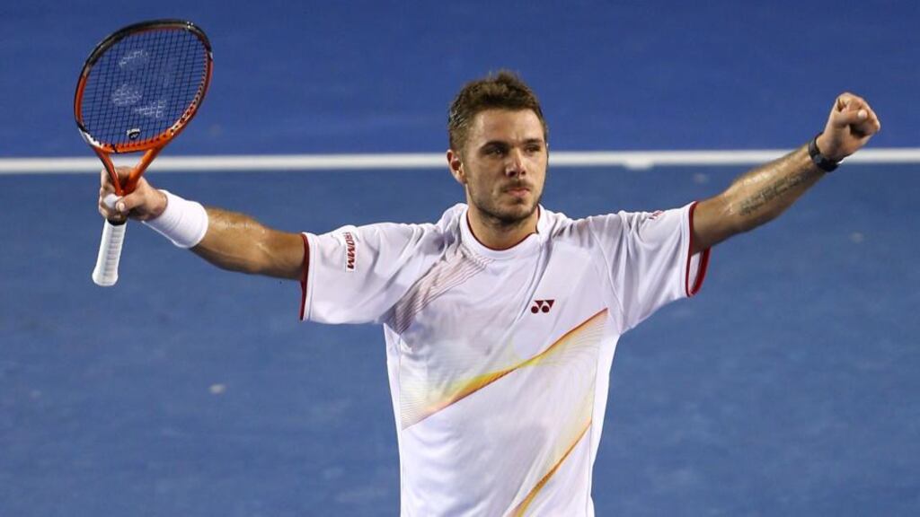 Stanislas Wawrinka of Switzerland celebrates winning championship point in his men’s final match against Rafael Nadal of Spain at the Australian Open at Melbourne Park. Photograph: Robert Prezioso/Getty Images