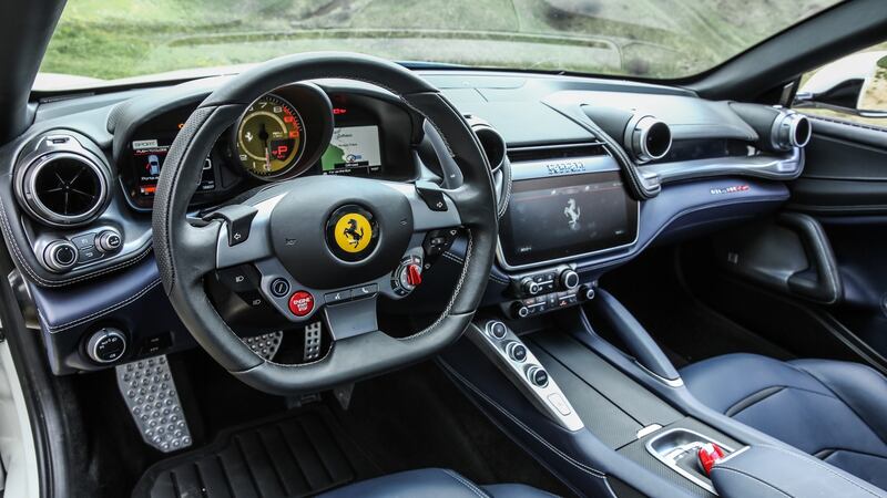 It is almost a caricature of Italian performance cars – that endless bonnet, the musical V12, the sheer glamour and impossibility of it all.