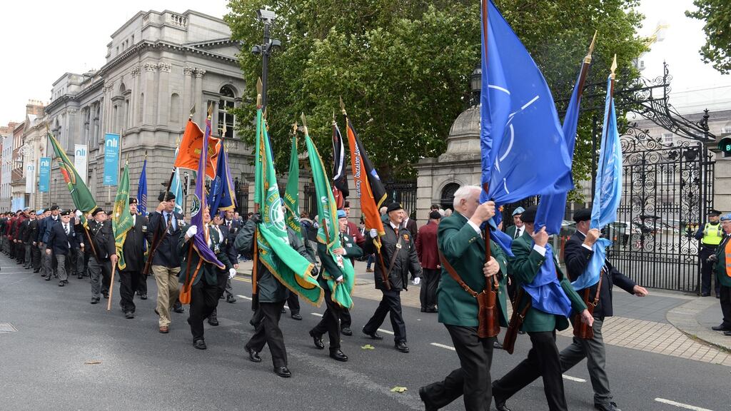 Families of serving defence personnel, and also retired members, protest over low pay in Defence Forces, outside Leinster House, Dublin. Photograph: Dara Mac Dónaill / The Irish Times