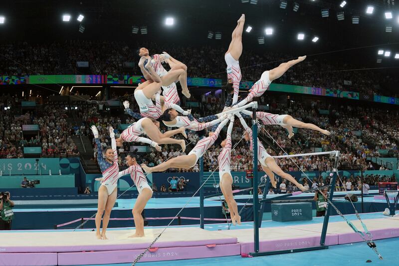A composite image of Sunisa Lee’s uneven bars dismount during the women's artistic gymnastics team finals. Photographs and composite image: Jeremy White/NYT
