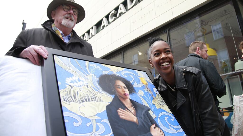 Artist Fergus Ryan with his subject Kassandra Karema and the resulting portrait of Kassandra, which he submitted for a 189th RHA annual exhibition this year. Sales at the exhibition hit a post-financial crash high. Photograph: Nick Bradshaw