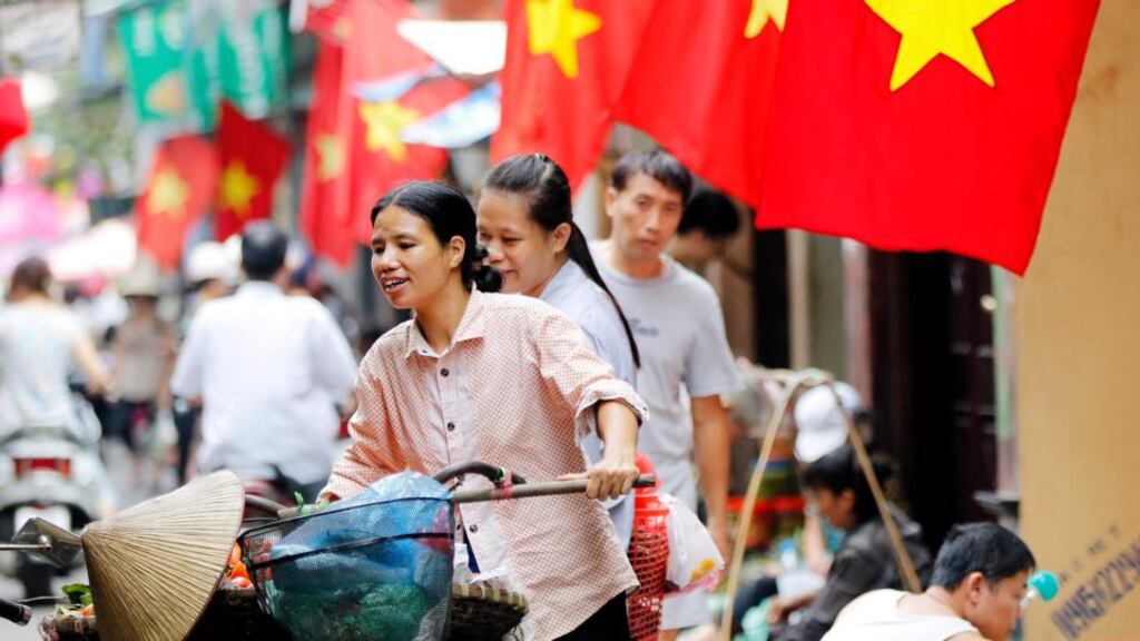 A busy street in Hanoi, Vietnam. “Vietnam is an important market in southeast Asia with a growing population,” said Mr Coveney. photograph: luong thai linh/epa