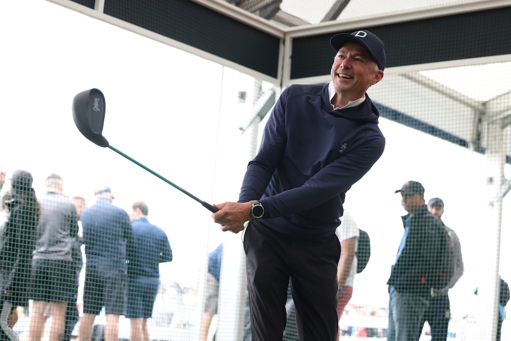 Jonathan Edwards plays a shot in the R&A Swingzone during the Open championship at Royal Troon, Scotland in July 2024. Photograph: Raymond Davies/R&A via Getty Images
