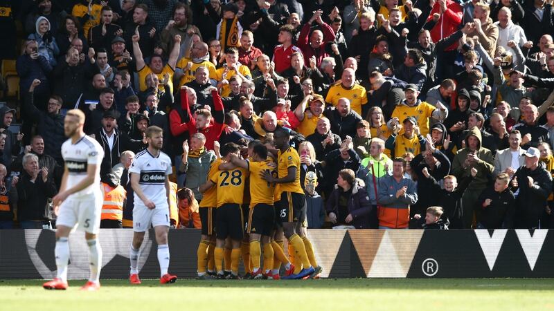 Wolves celebrate Leander Dendoncker’s winner against Fulham. Photograph: Jan Kruger/Getty