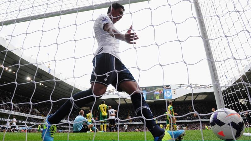 Paulinho of Tottenham celebrates after Gylfi Sigurdsson’s opening goal for theb team in Saturday’s Premeir League victory over Norwich City at White Hart Lane . Photograph: Jamie McDonald/Getty Images.