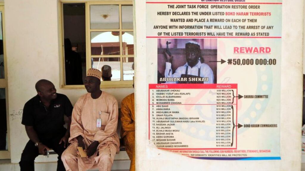 A poster advertising for the search of Boko Haram leader Abubakar Shekau is pasted on a wall in Baga village on the outskirts of Maiduguri, in the north-eastern state of Borno. Photograph: Reuters/Tim Cocks