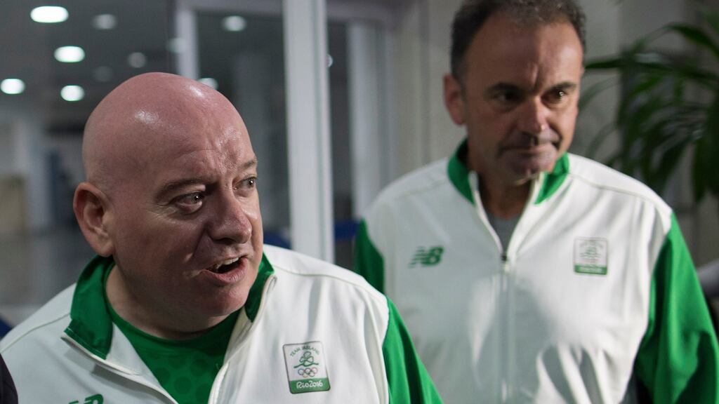 Olympic Council of Ireland’s team leader Kevin Kilty, right, and chief executive Stephen Martin leave the police headquarters in Rio de Janeiro, Brazil on Thursday. Police say the men are now ‘witnesses and not suspects’. Photograph: Leo Correa/AP