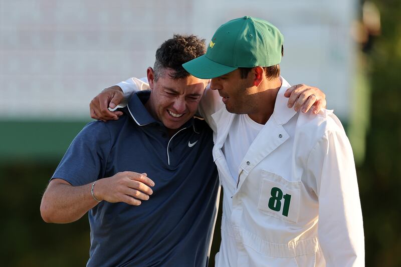 Rory McIlroy celebrates winning with caddie Harry Diamond after the playoff hole during the final round of the 2025 Masters Tournament at Augusta. Photograph: Michael Reaves/Getty Images