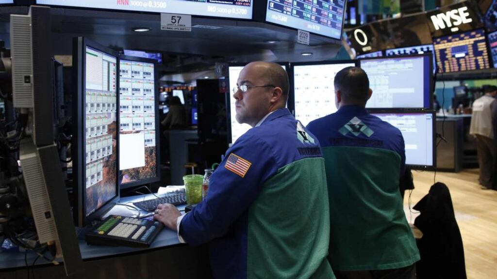 Trader Jarret Johnson of Virtu Financial works on the floor of the New York Stock Exchange. Photograph: Reuters/Chip East