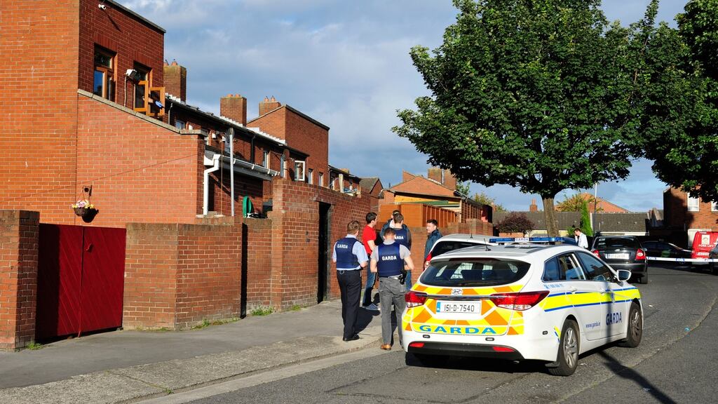 Gardaí at the scene in Drumalee Park off the North Circular Road in Dublin 7 where shots were fired. Photograph: Aidan Crawley