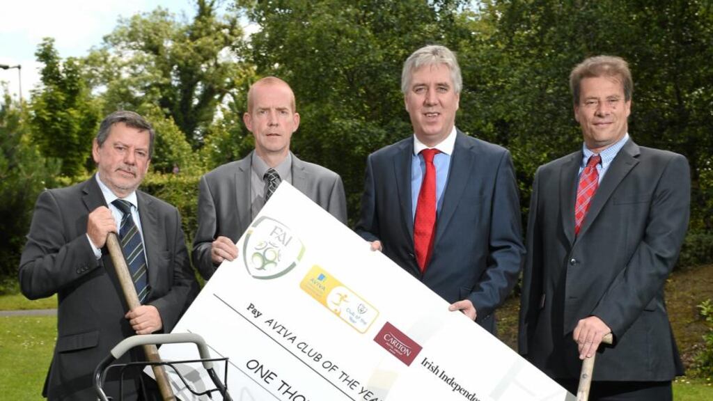 FAI CEO John Delaney with, from left, Donal Conway, FAI and chairman of the judging panel for the Aviva FAI Club of the Year, David Cummins, PRO Manor Rangers, Co Leitrim, and Mark Russell, Aviva. Photo: David Maher/Sportsfile