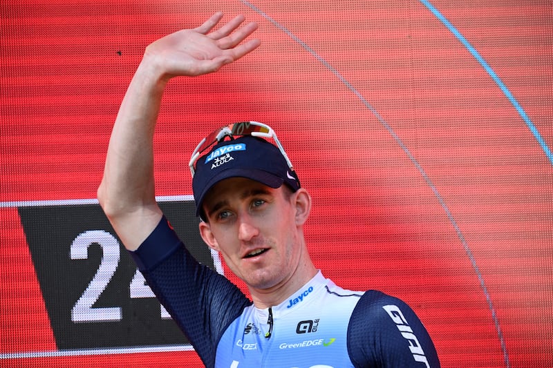 Eddie Dunbar celebrates on the podium winning stage 11 of the Vuelta a Espana. Photograph: Miguel Riopa/Getty Images