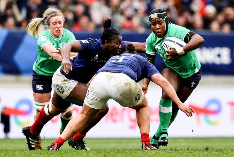 Ireland's Linda Djougang runs at the French defence during the Guinness Women's Six Nations match at Stade Marie-Marvingt in Le Mans. Photograph: Ben Brady/Inpho