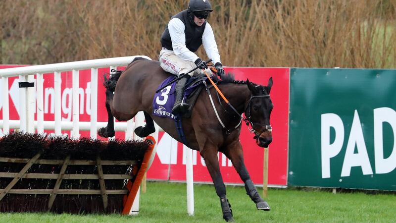 Flooring Porter ridden by Jamie Moore on their way to winning the Leopardstown Christmas Hurdle during the Leopardstown Christmas Festival. Photo: Niall Carson/PA Wire