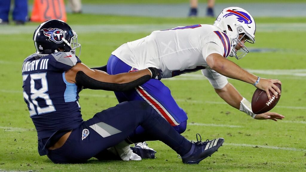 Harold Landry III of the Tennessee Titans sacks Josh Allen of the Buffalo Bills in the second quarter at Nissan Stadium in Nashville, Tennessee. Photograph: Getty Images