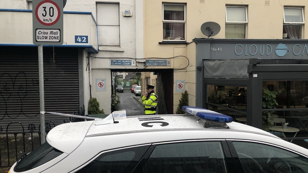 A garda at the scene of a fatal stabbing in north inner city Dublin. Photograph: Jack Power