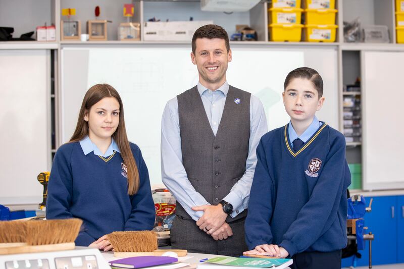 Principal Sean Stack and first year sudents Carly Nolan and Jack D'Arcy at St Joseph’s Secondary School, Fairview, Dublin.
Photograph: Tom Honan