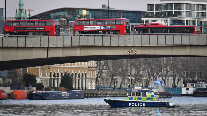 A police boat on the River Thames near London bridge following a ‘terror related’ incident. Photograph: Dominic Lipinski/PA Wire