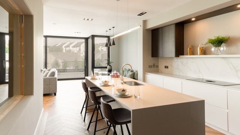 Michael Farrell-designed kitchen is blissfully uncluttered by overhead cabinets; Bora extractor helps with this streamlined look.