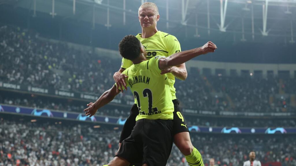 Erling Haaland celebrates scoring Borussia Dortmund’s second against Besiktas with Jude Bellingham. Photograph: Alex Grimm/Getty