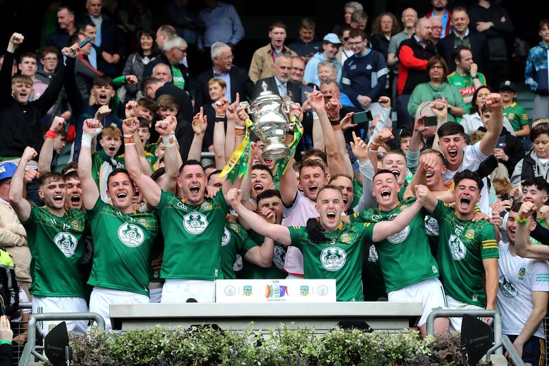 Meath players celebrate with the Tailteann Cup. Photograph: Bryan Keane/Inpho