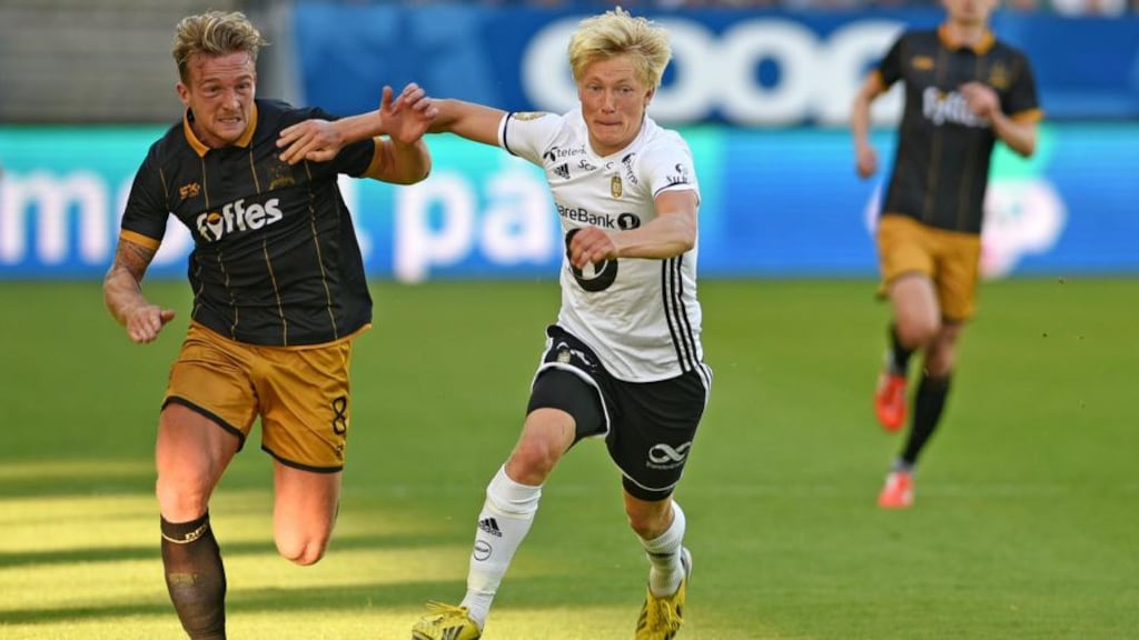 Dundalk’s John Mountney battles with Birger Meling of Rosenborg during their Champions League second qualifying round second leg clash at Lerkendal Stadion, Trondheim, Norway. Photo: Ciaran Culligan/Inpho