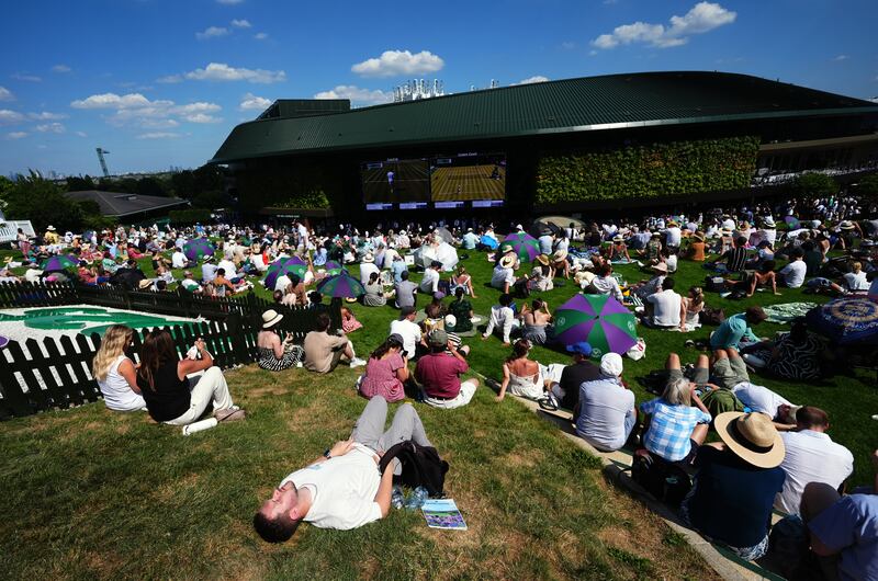 Spectators attend the opening day of the 2025 Wimbledon Championships at the All England Lawn Tennis and Croquet Club in London on Monday. Photograph: Mike Egerton/PA