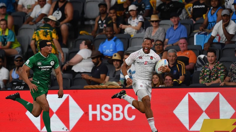 Dan Norton breaks clear to score a try against Ireland Sevens. Photograph: Sam Mooy/AFP/Getty