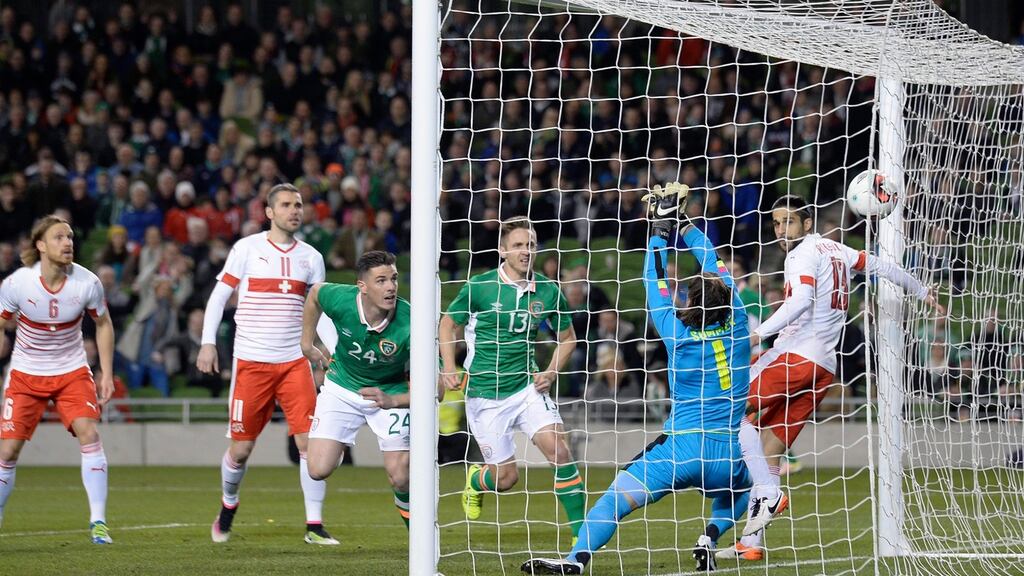Ciaran Clark scores the Republic of Ireland’s goal against Switzerland goalkeeper Yann Sommer during the friendly socmatch at the Aviva Stadium. Photograph: Walter Bieri/EPA