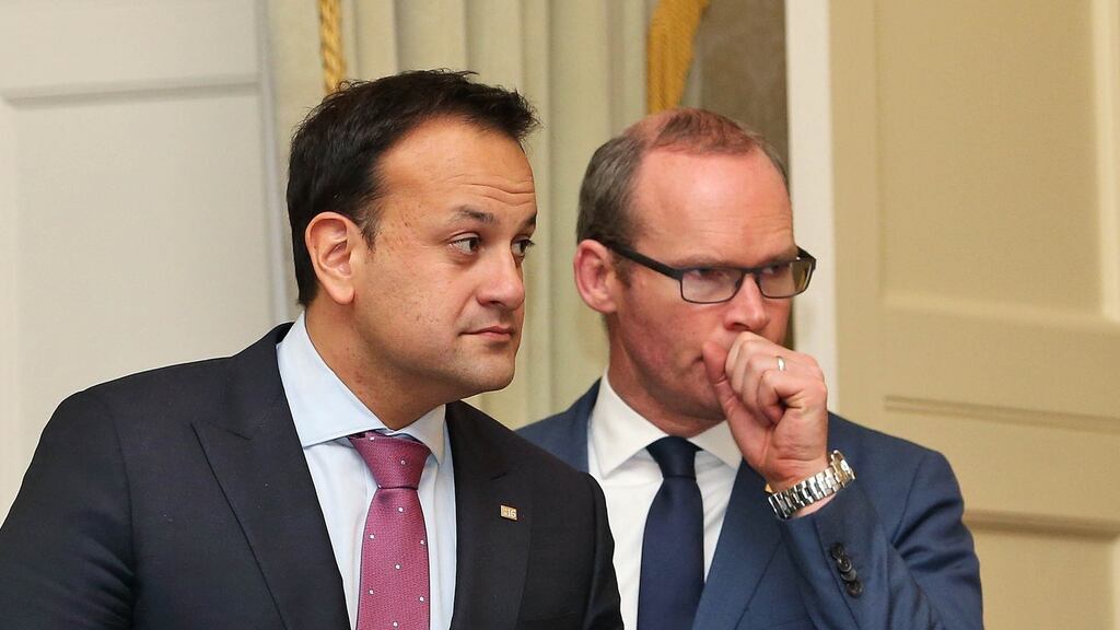 Leo Varadkar and Simon Coveney are considered the frontrunners to replace the Taoiseach. Photograph: Colin Keegan/Collins Dublin