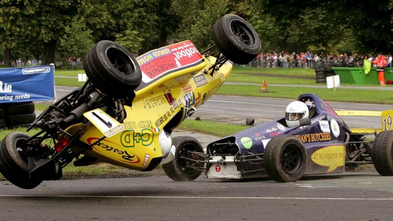 A David Sleator photograph showing Enda O Connor’s racing car being nudged over by Adam Craughan during a first corner incident during the Hilton Kilmainham Phoenix Park Races in 2007. Photograph: David Sleator/The Irish Times
