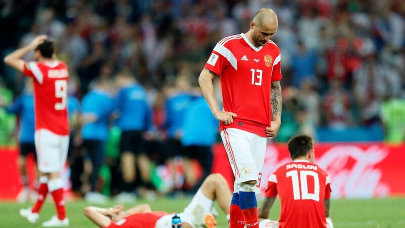 Russian players following the penalty shootout defeat to Croatia in the World Cup quarter-final in Sochi. Photograph: Ronald Wittek/EPA
