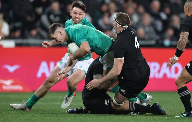 Ireland’s Jonathan Sexton is tackled by All Blacks Brodie Retallick. Photograph: Billy Stickland/Inpho