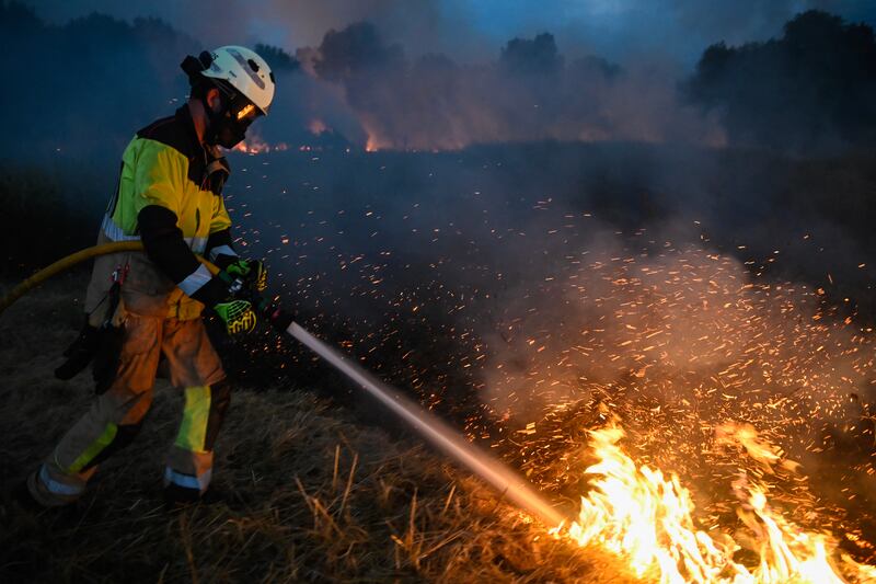 A wildfire near the village of Vilaza, in Ourense, northwestern Spain, on Tuesday. Photograph: Miguel Riopa/AFP/Getty