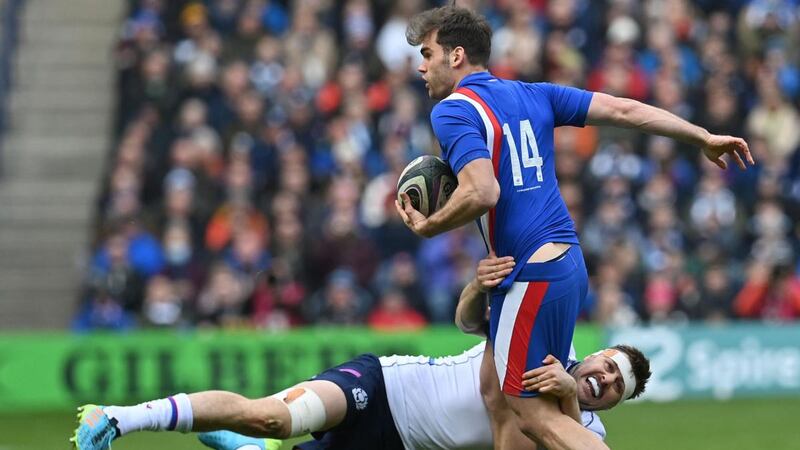 Scotland flanker Nick Haining tackles France winger Damian Penaud during the Six Nations match at Murrayfield. Photograph: Paul Ellis/AFP via Getty Images